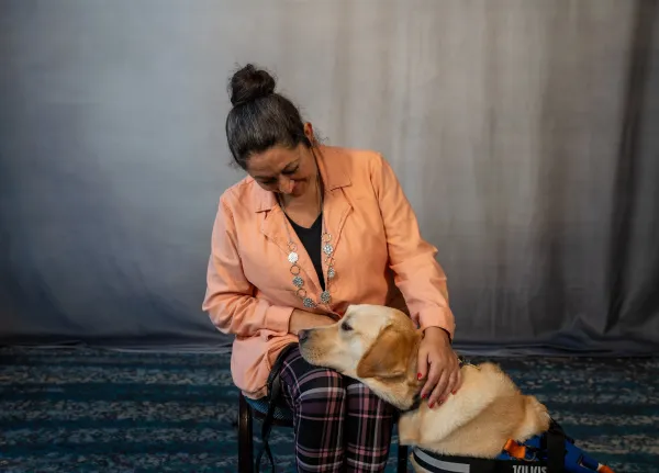 Inspirational Mom of 5 Who Is Blind Graduates with Honors, Celebrated Alongside Her Guide Dog
